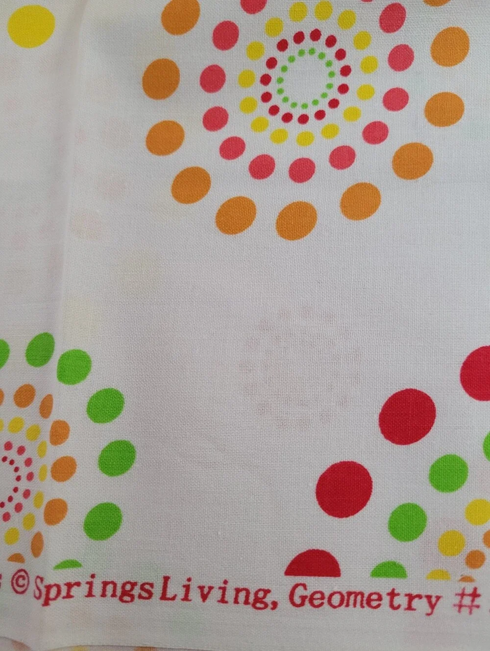 Spring Industries White Sewing Fabric with Colorful Dot Burst Pattern (1519)